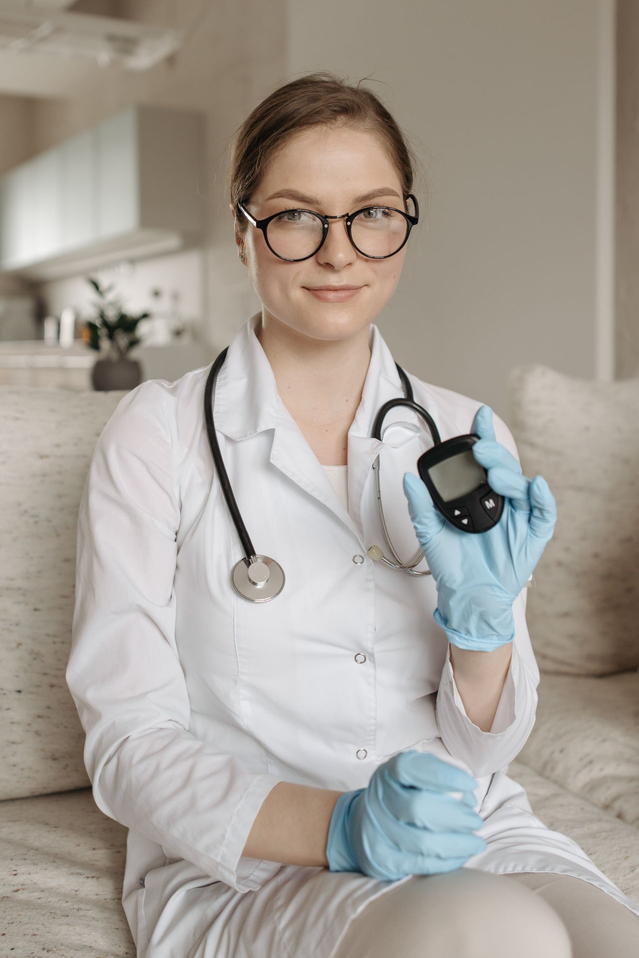 Optician explaining diabetes eye health to patient at home