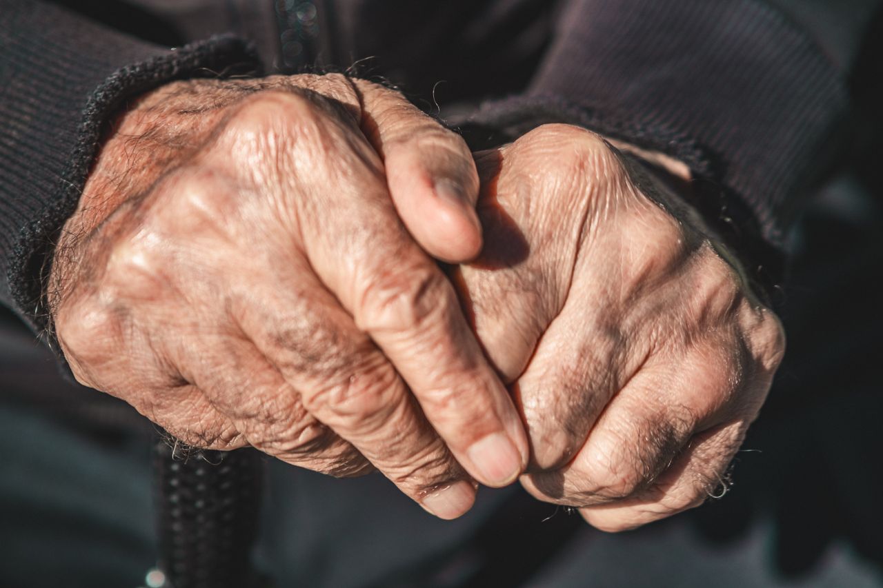 Elderly person with Parkinson's receiving home eye care
